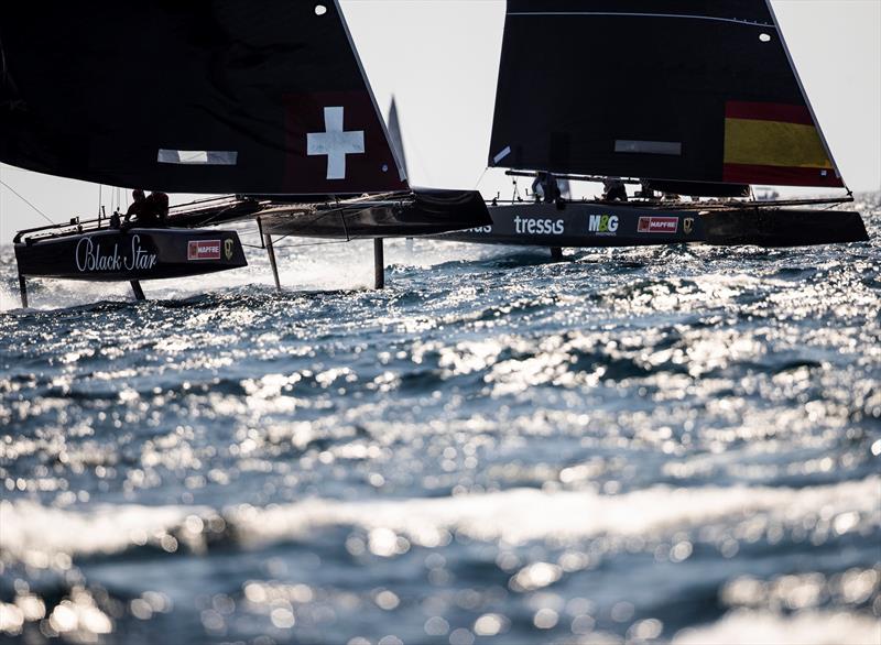 Christian Zuerrer's Black Star Sailing Team jockeys with Iker Martinez's M&G Tressis Silicius. - Copa del Rey MAPFRE photo copyright Tomas Moya / Sailing Energy / World Sailing / GC32 Racing Tour taken at Real Club Náutico de Palma and featuring the GC32 class