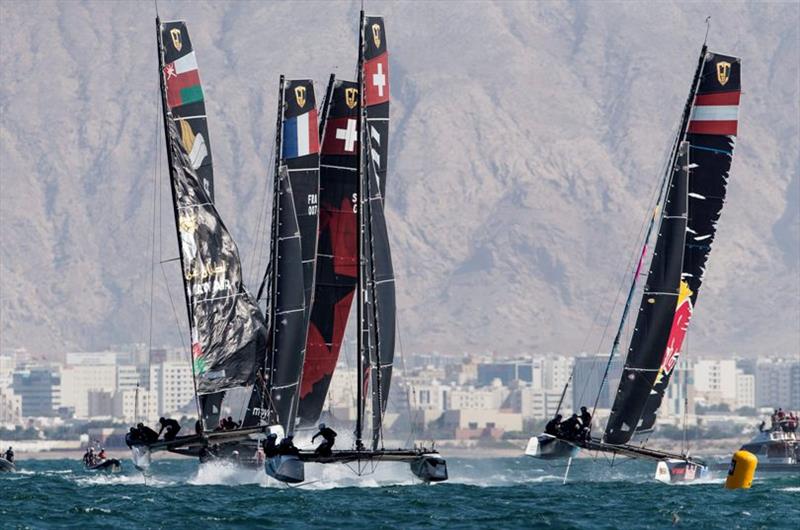 Alinghi leads at the all-important first reaching mark - GC32 Oman Cup day 3 photo copyright Sailing Energy / GC32 Racing Tour taken at  and featuring the GC32 class