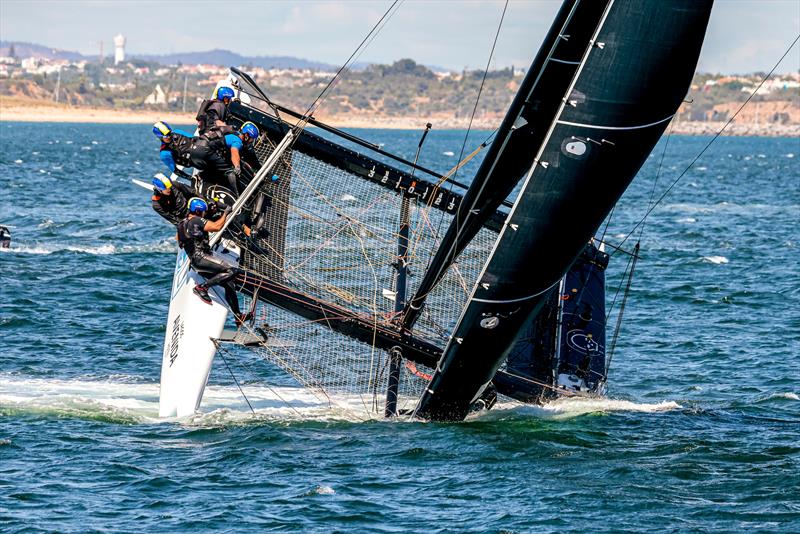 Erik Maris' Zoulou buries her bows during today's final race on day 3 of the GC32 Racing Tour Lagos Cup - photo © Sailing Energy / GC32 Racing Tour