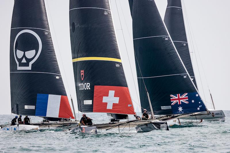 Alinghi Red Bull Racing leads Zoulou and .film AUS Racing at the Lagos GC32 Worlds photo copyright Sailing Energy / GC32 Racing Tour taken at Clube de Vela de Lagos and featuring the GC32 class