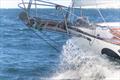 Elliott Smith (27) / USA / Gale Force 34 – ” SECOND WIND ” bowsprit repairs on Simon's Town mooring © Simon McDonnell / FBYC