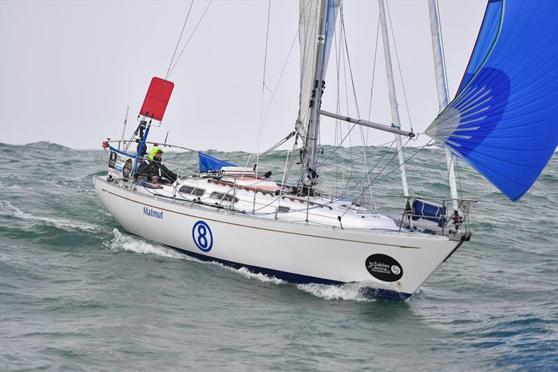 Jean-Luc Van Den Heede and his Rustler 36 yacht MATMUT crossing the finish line at Les Sables d'Olonne to win the 2018 Golden Globe Race - photo © Christophe Favreau / PPL / GGR