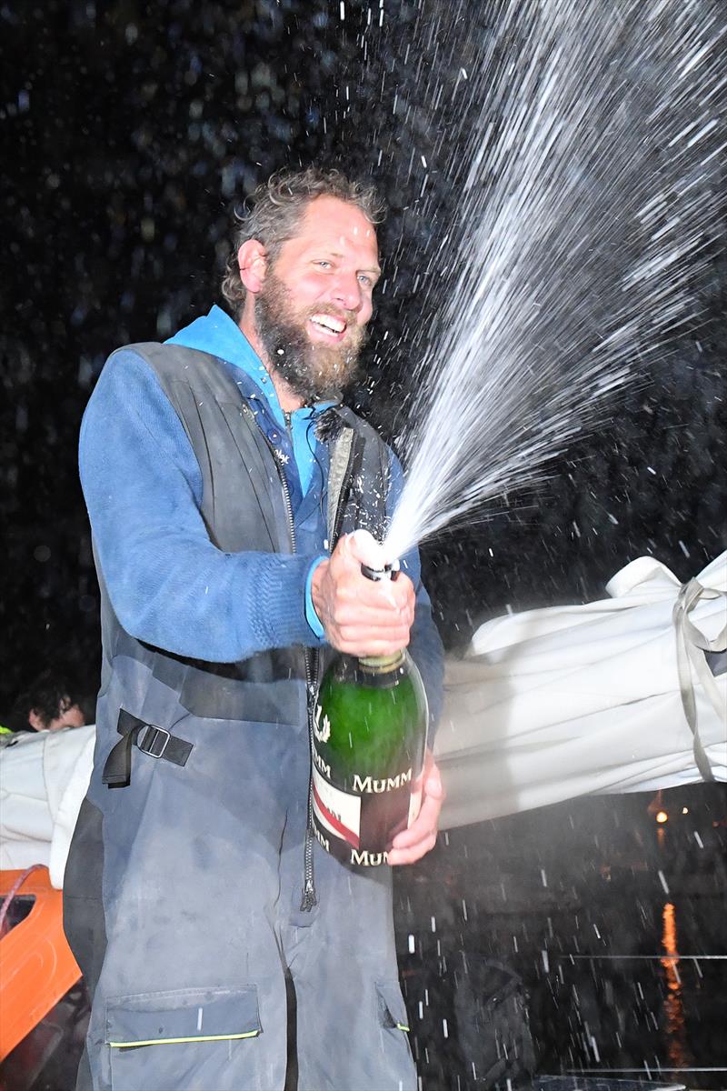 All smiles after 7 months alone at sea. Slats ran out of drinking water yesterday morning and the celebratory champagne was his first drink that day - Golden Globe Race photo copyright Christophe Favreau / PPL / GGR taken at  and featuring the Golden Globe Race class