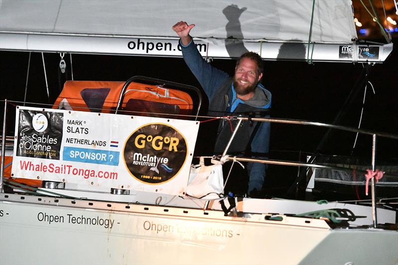 Great to be back! Mark Slacks salutes the crowds waiting to catch a glimpse of him on his return to Les Sables d'Olonne - Golden Globe Race photo copyright Christophe Favreau / PPL / GGR taken at  and featuring the Golden Globe Race class