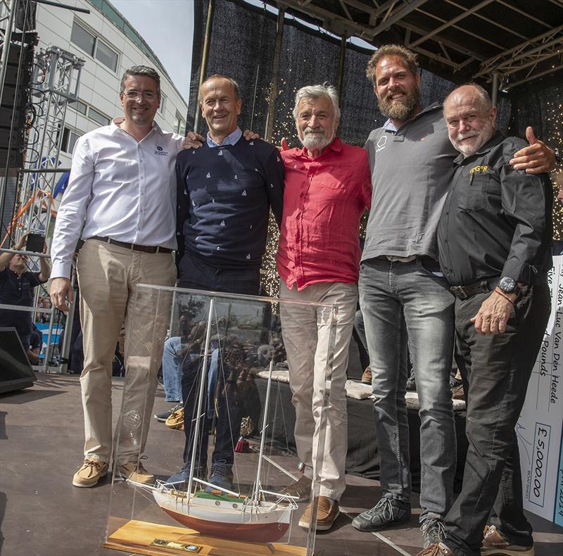 Winners with the GGR Perputual trophy made from wood salvaged from the original Suhaili. Left: Yannick Moreau - Mayor of Les Sables d'Olonne Aglomoration. Right: Don McIntyre, Chairman of the 2018 GGR - Golden Globe Race, Day 295 photo copyright Tim Bishop / PPL / GGR taken at  and featuring the Golden Globe Race class