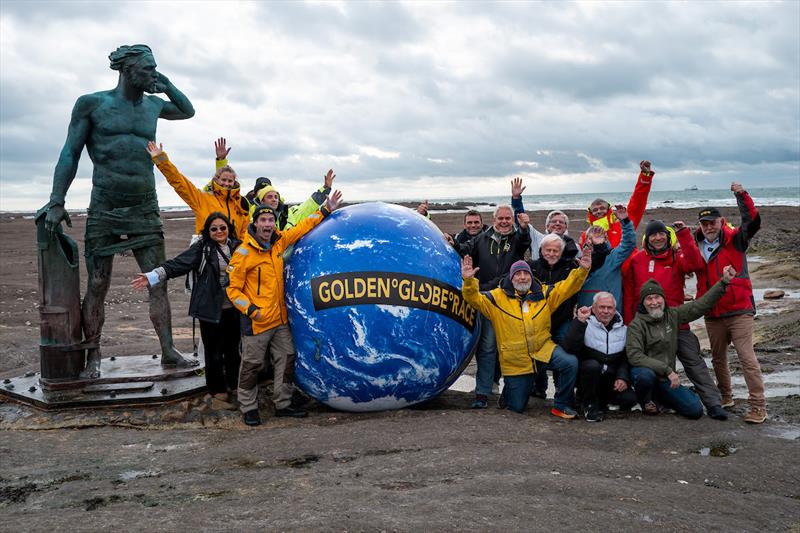 15 out of the 26 Golden Globe Race 2026 skippers and the GGR Team gather on the beach in Les Sables d'Olonne for a special photo with Ulysses, the Greek God that watching over the sea photo copyright Rob Havill / GGR 2026 taken at  and featuring the Golden Globe Race class