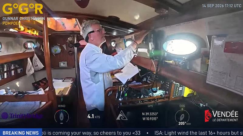 Alone at sea, with world watching. Gunnar Christensen attends to life below deck aboard POMPOEN in this GGR Window LIVE image. The one-way broadcasts reveal everyday routines behind the race, bringing sailors' world ashore while preserving outside world - photo © GGR Window LIVE / GGR2026