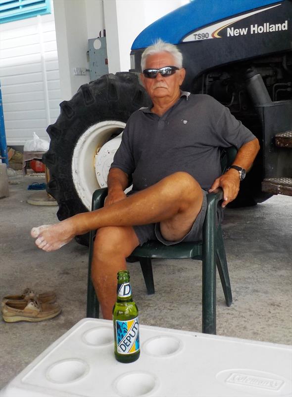 1967 winner Jack Hoad brings competitiors a beer photo copyright Michelle Evans taken at Barbados Yacht Club and featuring the GP14 class