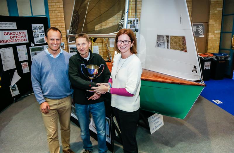 Mark Jardine (left) and Sarah Treseder (right) with Concours d'Elegance winner John Clementson and his Graduate dinghy 'Eclipse' photo copyright Paul Wyeth / RYA taken at RYA Dinghy Show and featuring the Graduate class