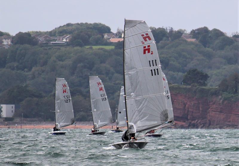 Ian Sanderson leads the fleet down the run in race 1 on day 1 of the Hadron H2 Nationals in Torbay photo copyright Keith Callaghan taken at Royal Torbay Yacht Club and featuring the Hadron H2 class