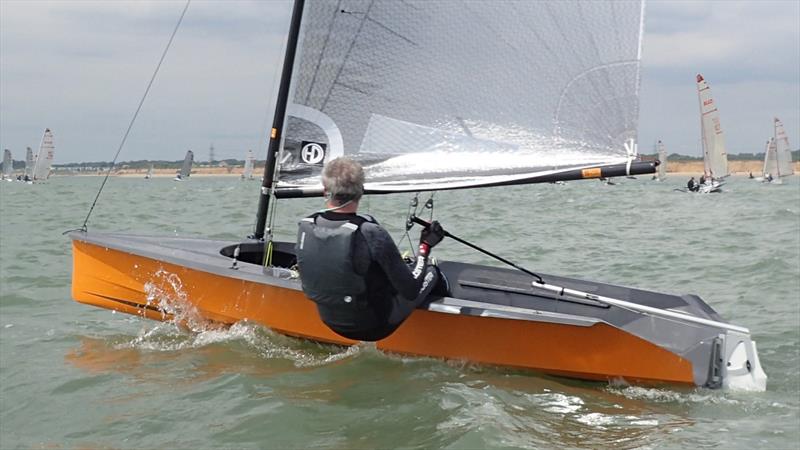 Adrian Williams' aptly named 'Tangerine Dream' during the Hadron H2 Open at Itchenor photo copyright Keith Callaghan taken at Itchenor Sailing Club and featuring the Hadron H2 class