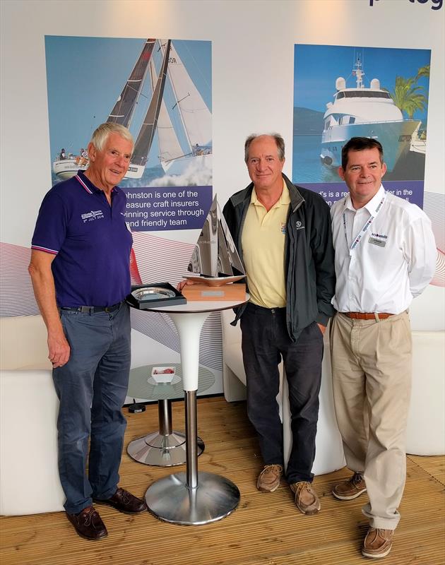 (l-r) Mark Wynter, Commodore of the Island Sailing Club and owner of Alchemist, Jeff Warboys, winner of the Seamanship Award, Keith Lovett from sponsor Haven Knox-Johnston photo copyright Mark Jardine taken at  and featuring the  class