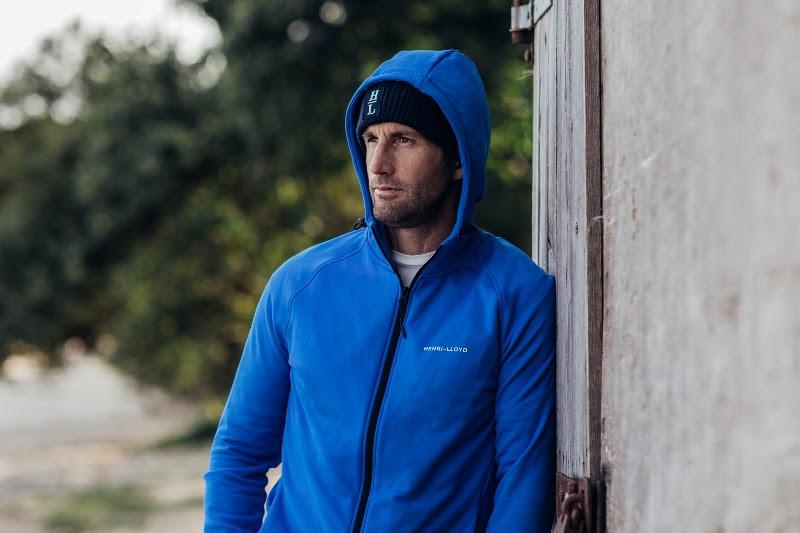 Sir Ben Ainslie, Chief Technical Officer & prominent Shareholder, wears Mav Mid Zip Hood featuring 100% recycled polyester which creates a new life for 17 pre-used 1.5Litre PET bottles - photo © Henri-Lloyd