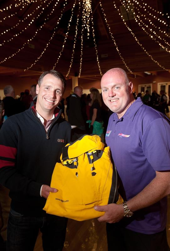 A new Henri Lloyd drysuit is presented to Andrew Taylor photo copyright Noah Berger taken at South Beach Yacht Club and featuring the  class