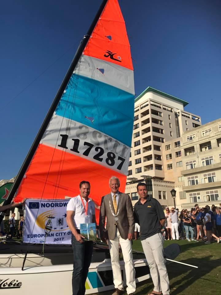 Klaas van Duin, the Mayor and Michel Corigliano on day 2 of the Hobie® Multiworlds And Europeans photo copyright David Brookes taken at Zeilvereniging Noordwijk and featuring the Hobie 16 class