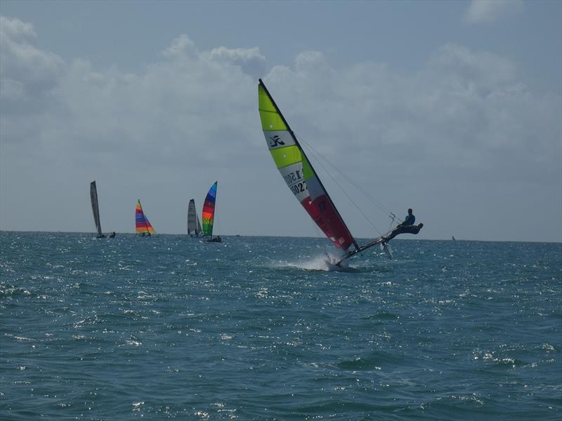 Trapezing on a Hobie 16 during the RCIYC Hobie Fleets Love Wine 'Summer Breeze' series photo copyright Elaine Burgis taken at Royal Channel Islands Yacht Club and featuring the Hobie 16 class