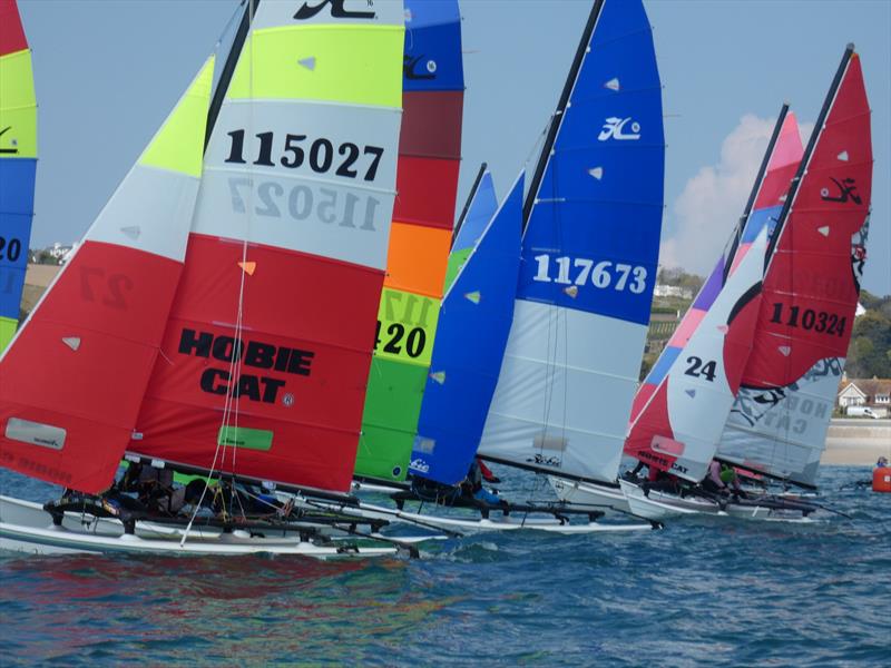 RCIYC Hobie Fleet - Love Wine 'Summer Breeze' series photo copyright Elaine Burgis taken at Royal Channel Islands Yacht Club and featuring the Hobie 16 class