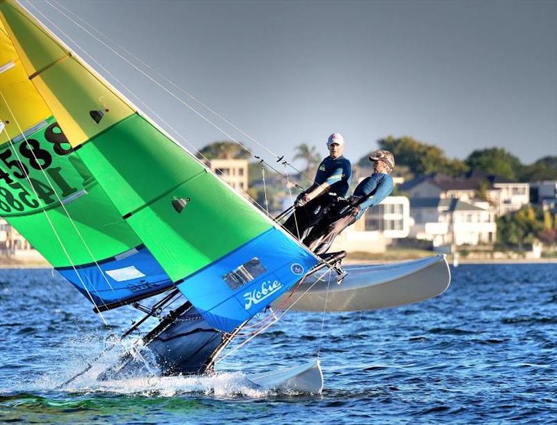 Darren and Claire Flying a hull photo copyright Lindsay Preece / Ironbark Photos taken at Esperance Bay Yacht Club and featuring the Hobie 16 class
