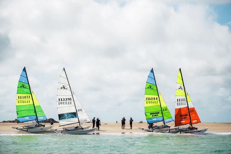 Estimating Services Minquiers Cat Dash photo copyright Jack Clayden taken at Royal Channel Islands Yacht Club and featuring the Hobie 16 class