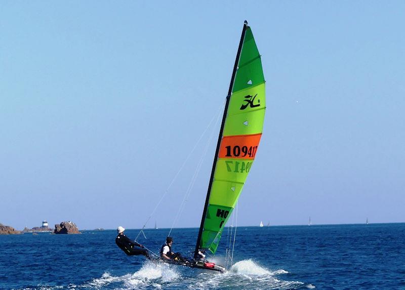 Fly-Bi 5, Luke Paxton-Garniet and Peter Washington during the RCIYC Rossborough Round the Island Race 2022 photo copyright Bill Harris taken at Royal Channel Islands Yacht Club and featuring the Hobie 16 class