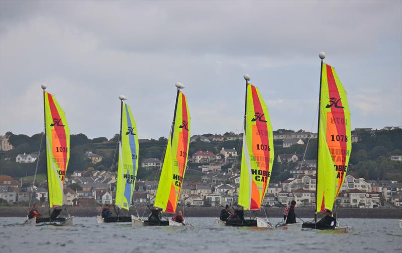 Hobie Dragoon start at the 2015 UBS Jersey Regatta photo copyright Louise Bennett-Jones taken at Royal Channel Islands Yacht Club and featuring the Hobie Dragoon class