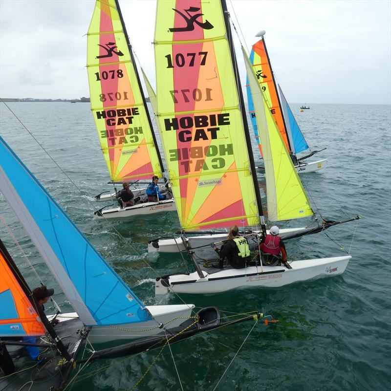 Hobie Dragoon start during the Savills Channel Islands Hobie Cat Championships photo copyright Elaine Burgis taken at Royal Channel Islands Yacht Club and featuring the Hobie Dragoon class