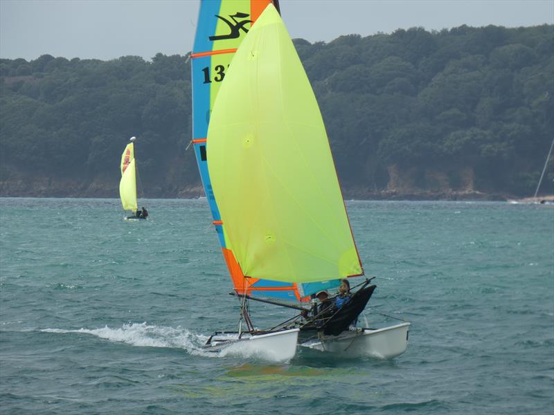 Hobie Dragoon downwind during the Savills Channel Islands Hobie Cat Championships photo copyright Elaine Burgis taken at Royal Channel Islands Yacht Club and featuring the Hobie Dragoon class