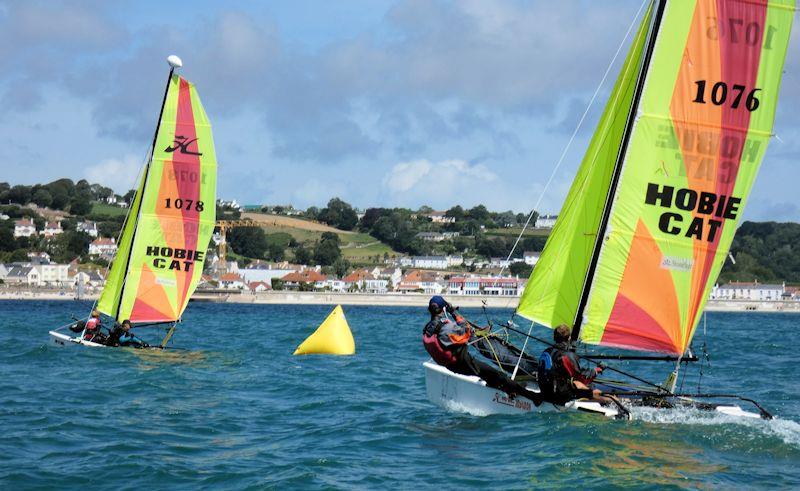 Archie and Jamie Willetts, win the Dragoons Junior class in the RCIYC Hobie Fleets Love Wine 'Summer Breeze' Series 2020 photo copyright Elaine Burgis taken at Royal Channel Islands Yacht Club and featuring the Hobie Dragoon class