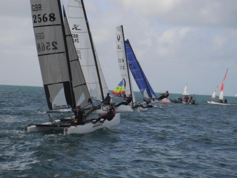 Hobie Tigers and Wildcats at the Stonehage Channel Islands Hobie Cat Championships 2014 photo copyright Elaine Burgis taken at Royal Channel Islands Yacht Club and featuring the Hobie Tiger class