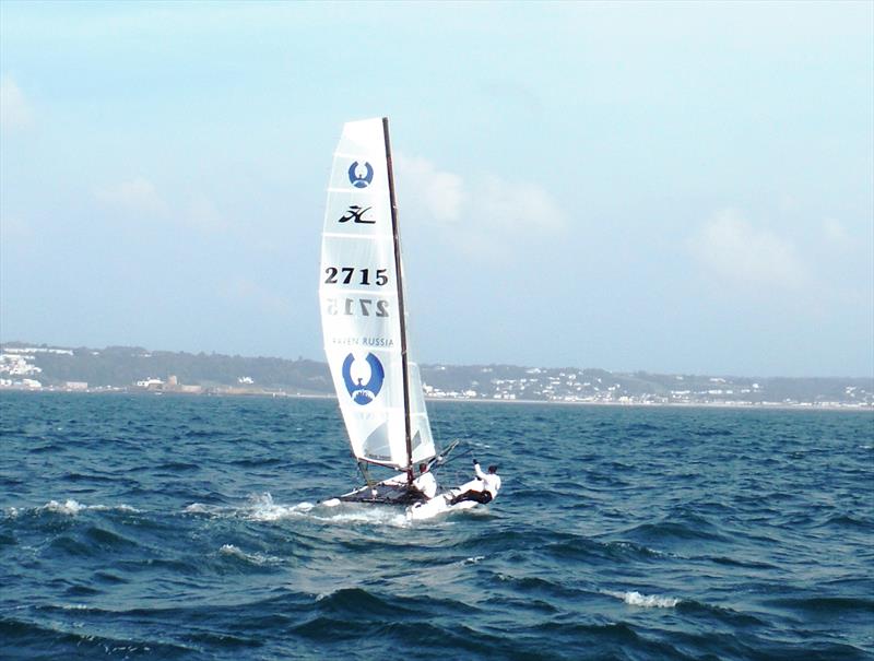 Poker Face 4 during the UBS Jersey Regatta 2014 photo copyright Louise Bennett-Jones taken at Royal Channel Islands Yacht Club and featuring the Hobie Tiger class