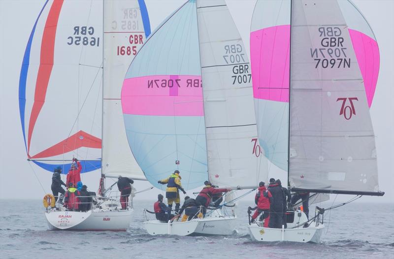 Miss Moneypenny and Mad Dog battle downwind in the 707 fleet in the Scottish Series at Clyde photo copyright Marc Turner / CCC taken at Clyde Cruising Club and featuring the 707 class