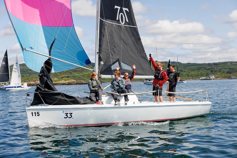 Guy Neville, sailing with his daughters Ruth and Kay, Alex Spence and Nick Speechley, collect the top overall award at the Jura Scottish Series - photo © Andrew Wallace