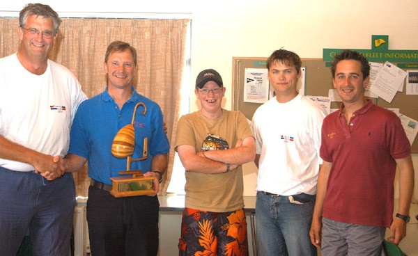 Dermot O'Morchoe accepting the Ruddles Trophy with Crew Ian, Jonathon and Brian from the fleet captain Paul Bankroft at the Hunter Formula One nationals photo copyright Paul Bankroft taken at Rutland Sailing Club and featuring the Hunter Formula One class