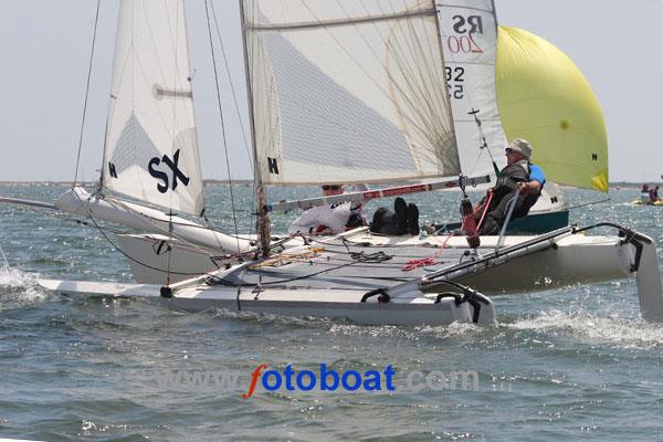 Hurricane 5.9 SX at the River Exe Regatta photo copyright Mike Rice / www.fotoboat.com taken at Topsham Sailing Club and featuring the Hurricane 5.9 SX class