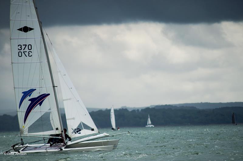 Richie Hanmore & Matt Kimber win the Hurricane class at the Stokes Bay Cat Open photo copyright Lotte Johnson / www.lottejohnson.com taken at Stokes Bay Sailing Club and featuring the Hurricane 5.9 SX class