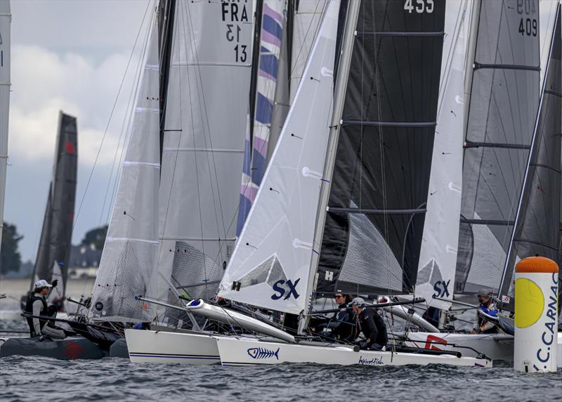 A tight squeeze at the pin end during the Hurricane 5.9 SX Europeans during Eurocat at Carnac photo copyright David Maynard / www.alleycatphotographer.com taken at Yacht Club de Carnac and featuring the Hurricane 5.9 SX class