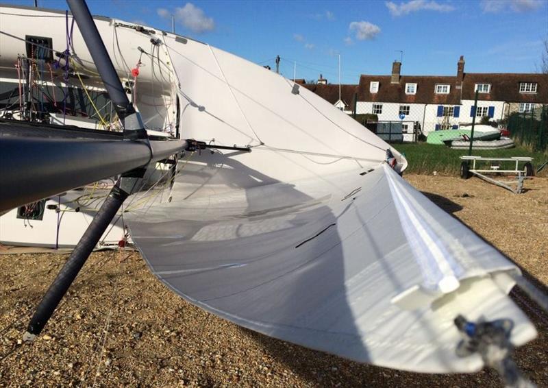 Richard Lovering analysing the Hyde Sails 505 sails photo copyright Hyde Sails taken at  and featuring the  class