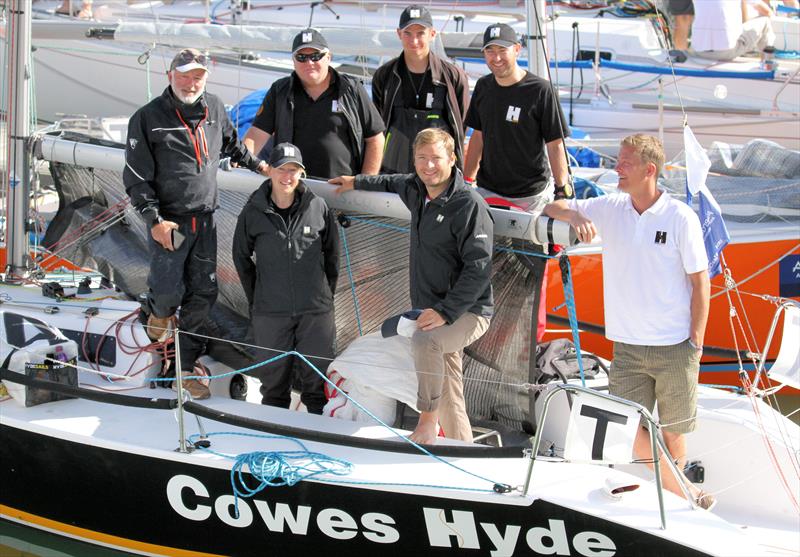 Nigel Grogan (left) with the team on Cowes Hyde during Cowes Week photo copyright Mark Jardine taken at  and featuring the  class