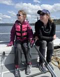 Claire (age 8) joins Cascadia Sailing for an day of keelboat sailing, where she enjoys some pro driving tips from Christina Wolfe, the team's skipper &copy; Image courtesy of Cascadia Sailing Collection