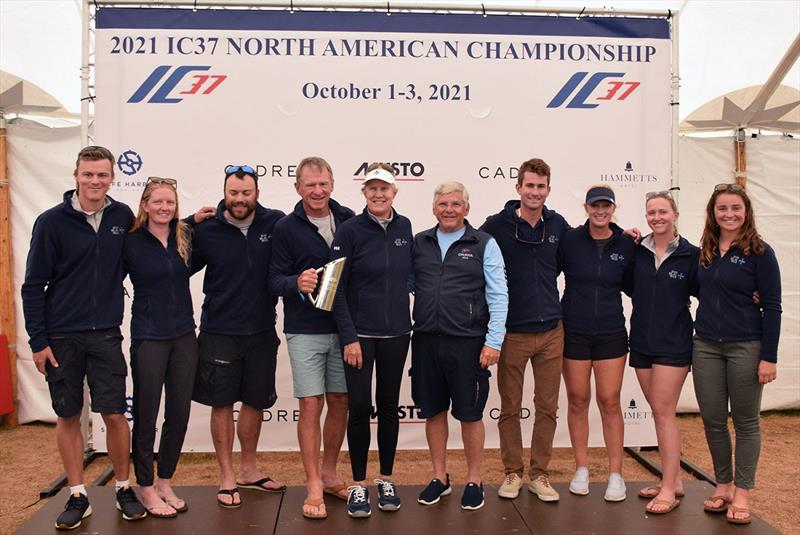 2021 IC37 North American Championship winning crew on Das Blau Max (above, L-R): Nick Sertl (helm), Amina Brown, Jake Doyle, Mark Sertl, Cory Sertl, NYYC Commodore Christopher J. Culver, Hugh MacGillivray, Katja Sertl, Marly Isler and Marina Barzaghi photo copyright Paul Todd / www.outsideimages.com taken at New York Yacht Club and featuring the IC37 class