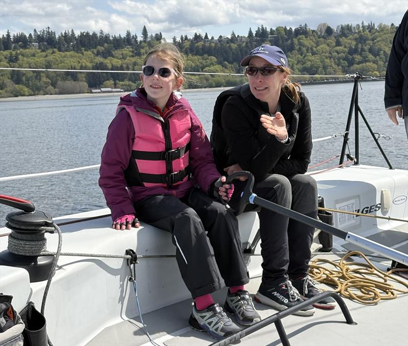 Claire (age 8) joins Cascadia Sailing for an day of keelboat sailing, where she enjoys some pro driving tips from Christina Wolfe, the team's skipper photo copyright Image courtesy of Cascadia Sailing Collection taken at Seattle Yacht Club and featuring the IC37 class