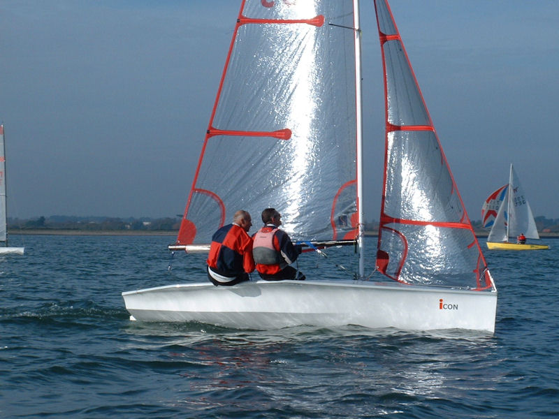 Mike Lyons & Simon Beddows win the Lymington Town Charity Pursuit Race photo copyright Barry Sticklen taken at Lymington Town Sailing Club and featuring the Icon class