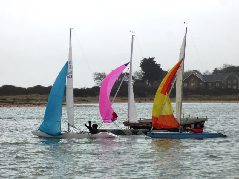 George Downer, Mark Downer & Justin Biddle battle downwind during the Bembridge Illusion January Jacket photo copyright Mike Samuelson taken at Bembridge Sailing Club and featuring the Illusion class