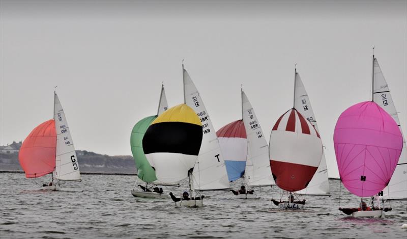Illusion fleet racing downwind, led by Peter Bramley, during the West Kirby Sailing Club Regatta photo copyright Alan Jenkins & Alan Dransfield taken at West Kirby Sailing Club and featuring the Illusion class
