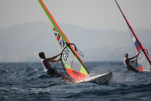 The sea breeze fills in on day five of the Olympic Sailing Regatta photo copyright Richard Langdon taken at  and featuring the IMCO class