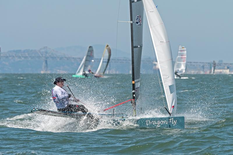 Alistair Warren (GBR 317) has a wet and wild ride during race two of the International Canoe worlds in San Francisco - photo © Leslie Richter / www.rockskippper.com