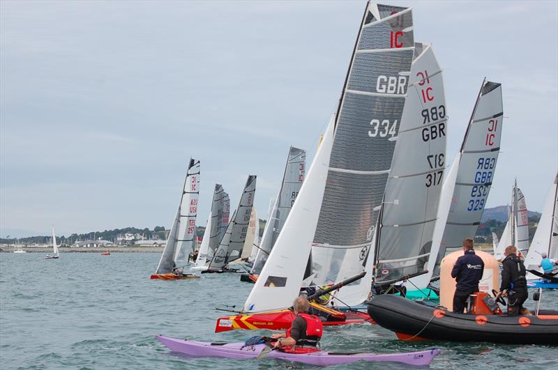 Should the guy in the purple boat have gone to Specsavers? Either that or he didn't read the SIs... sails are alive on day 1 of the International Canoe Worlds at Pwllheli photo copyright David Henshall taken at Plas Heli Welsh National Sailing Academy and featuring the International Canoe class