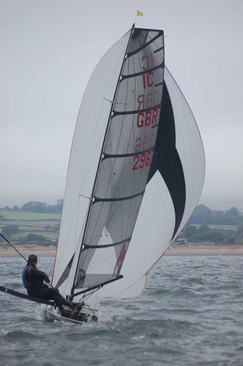 The asymmetrics starting to heat up on the downwind legs on day 2 of the International Canoe Worlds at Pwllheli photo copyright David Henshall taken at Plas Heli Welsh National Sailing Academy and featuring the International Canoe class