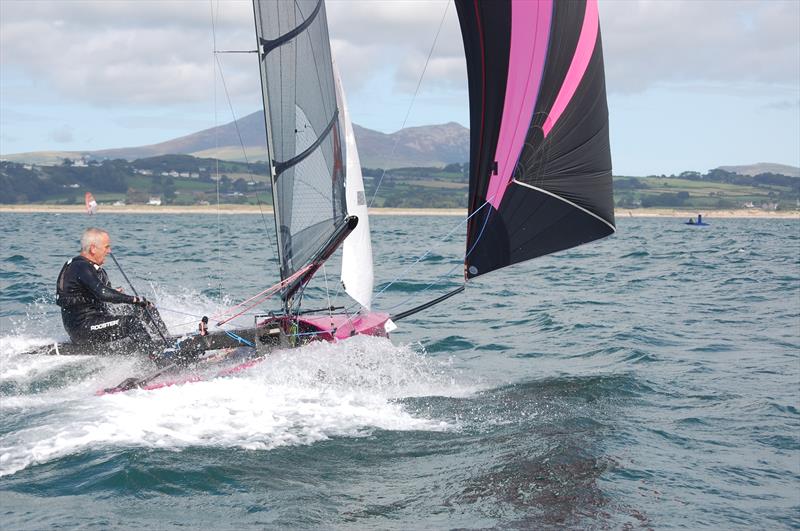 AC in a hurry - the leading boat can be seen inverted out ahead on day 5 of the International Canoe Worlds at Pwllheli photo copyright David Henshall taken at Plas Heli Welsh National Sailing Academy and featuring the International Canoe class