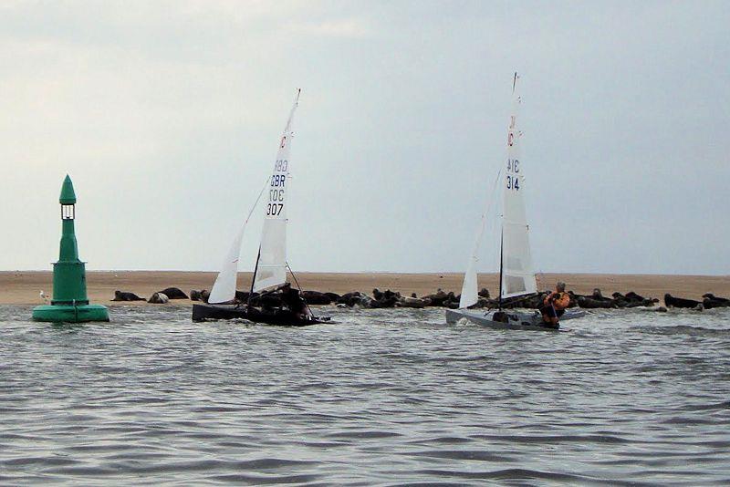 Rounding HE4 buoy on day 1 (with plenty of seals watching) - West Kirby Festival of Sailing photo copyright Tony Marston taken at West Kirby Sailing Club and featuring the International Canoe class